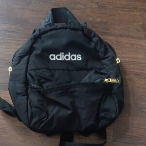 Adidas Black Backpack with Gold Accents